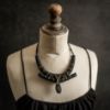Image de Collier tribal torque médaillon gravé en ébène Ravok